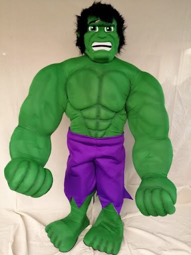 Hulk superhero character at a children's birthday party with kids